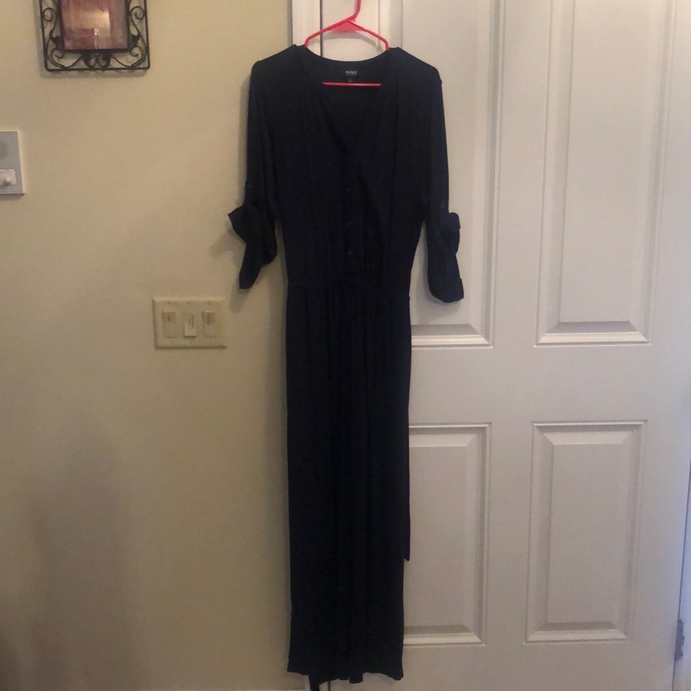 Navy blue jumpsuit. Size large. Never worn.